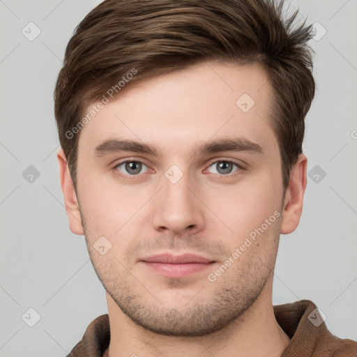 Neutral white young-adult male with short  brown hair and grey eyes