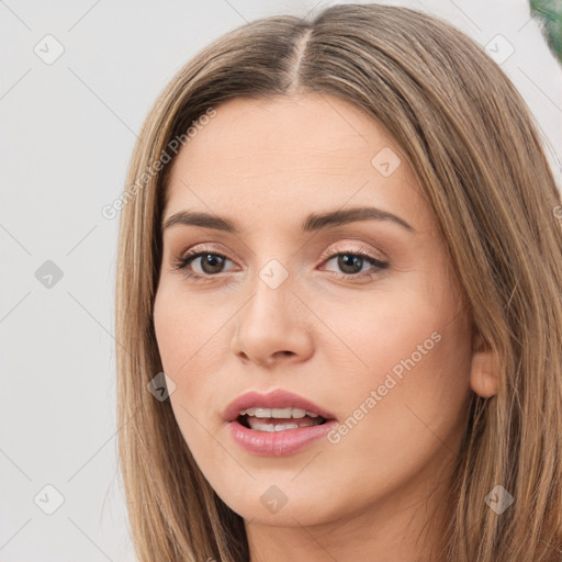 Joyful white young-adult female with long  brown hair and brown eyes