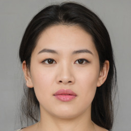 Neutral asian young-adult female with medium  brown hair and brown eyes