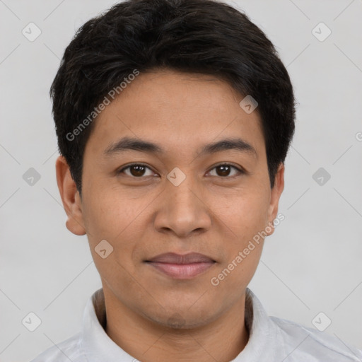 Joyful latino young-adult male with short  brown hair and brown eyes