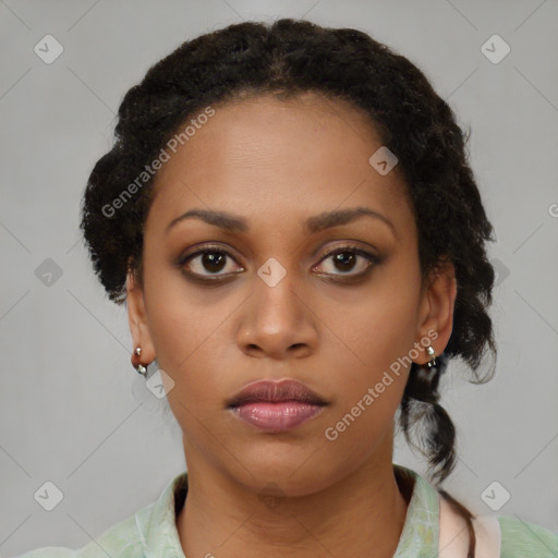 Neutral black young-adult female with medium  brown hair and brown eyes