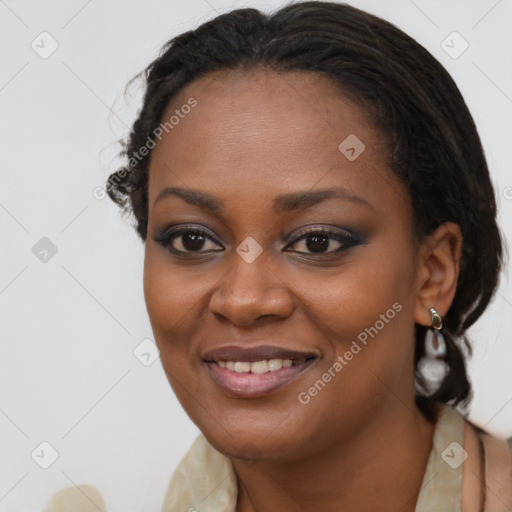 Joyful black young-adult female with long  brown hair and brown eyes