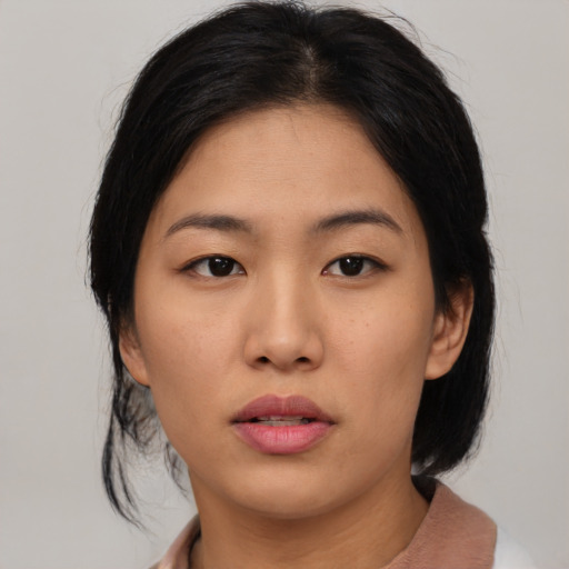Neutral asian young-adult female with medium  black hair and brown eyes