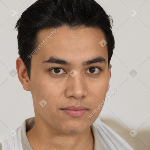 Neutral latino young-adult male with short  black hair and brown eyes