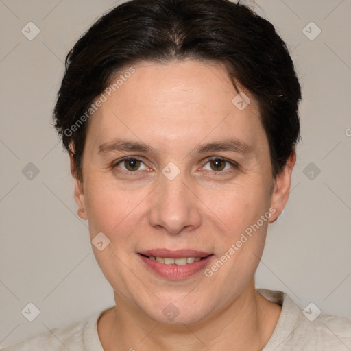 Joyful white adult female with short  brown hair and brown eyes