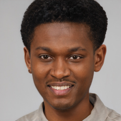 Joyful latino young-adult male with short  brown hair and brown eyes