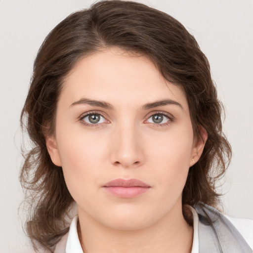 Neutral white young-adult female with medium  brown hair and brown eyes