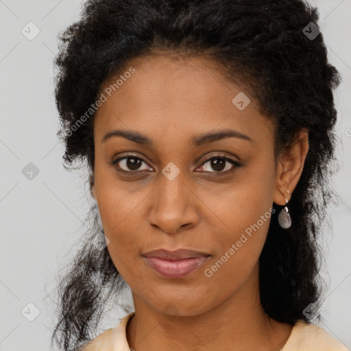 Joyful black young-adult female with long  brown hair and brown eyes