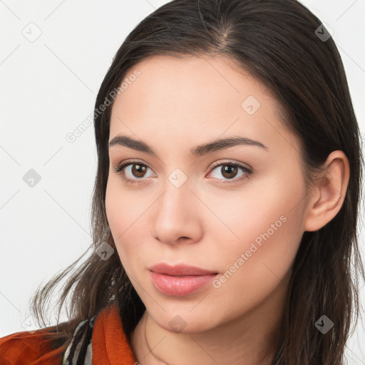 Neutral white young-adult female with long  brown hair and brown eyes