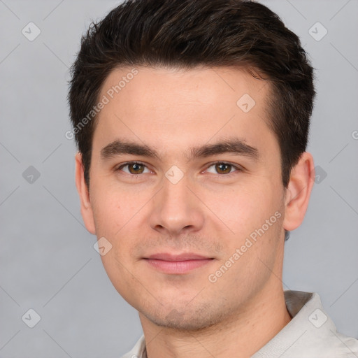 Joyful white young-adult male with short  brown hair and brown eyes
