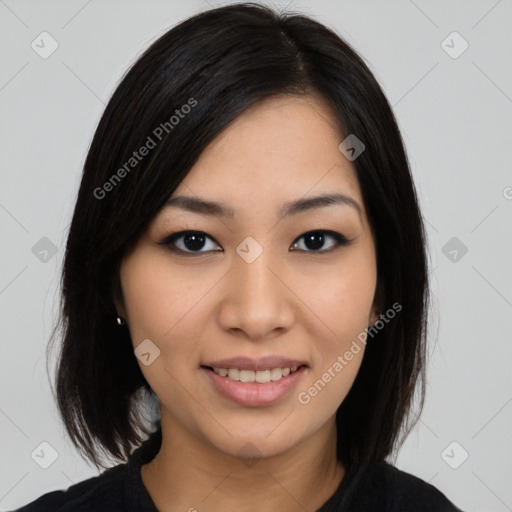 Joyful asian young-adult female with medium  black hair and brown eyes