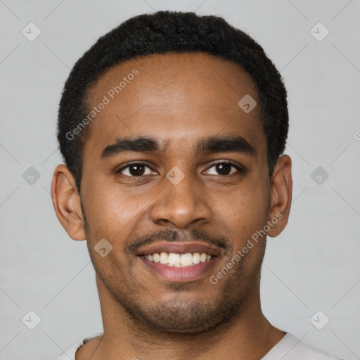 Joyful black young-adult male with short  black hair and brown eyes