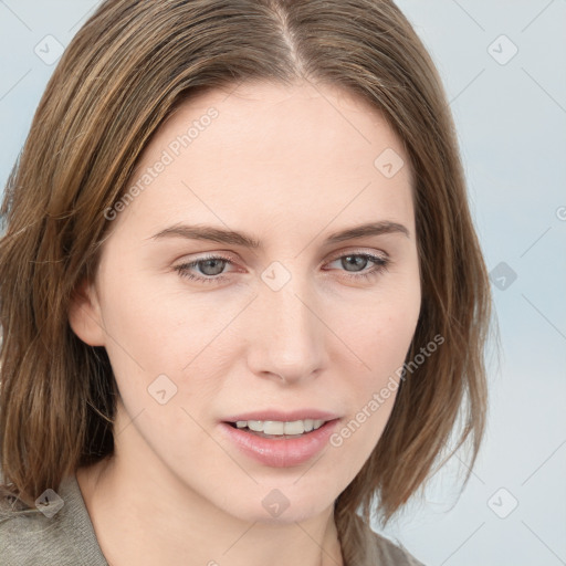 Joyful white young-adult female with medium  brown hair and blue eyes