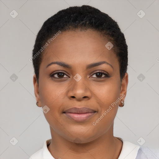 Joyful black young-adult female with short  black hair and brown eyes