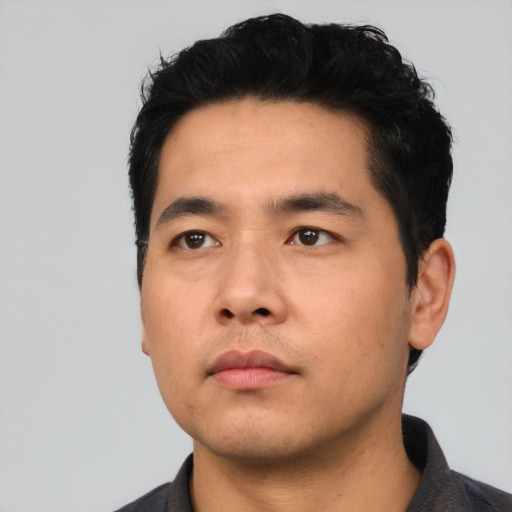 Neutral asian young-adult male with short  black hair and brown eyes