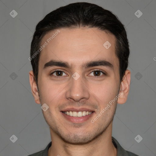 Joyful white young-adult male with short  brown hair and brown eyes