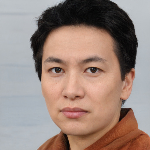 Neutral white adult male with short  brown hair and brown eyes