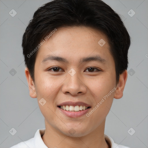 Joyful asian young-adult male with short  brown hair and brown eyes