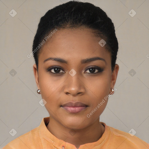 Joyful black young-adult female with short  black hair and brown eyes