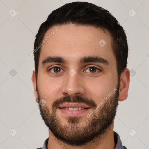 Neutral white young-adult male with short  black hair and brown eyes