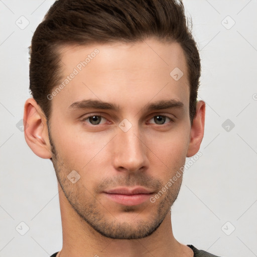 Neutral white young-adult male with short  brown hair and brown eyes