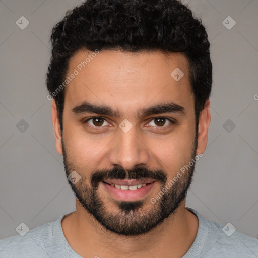 Joyful white young-adult male with short  black hair and brown eyes