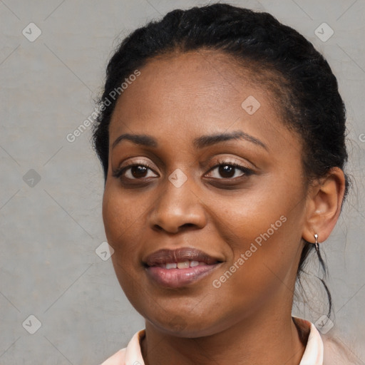 Joyful black young-adult female with medium  black hair and brown eyes