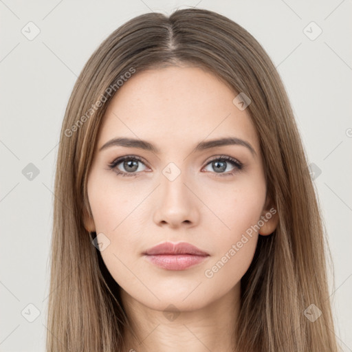 Neutral white young-adult female with long  brown hair and brown eyes