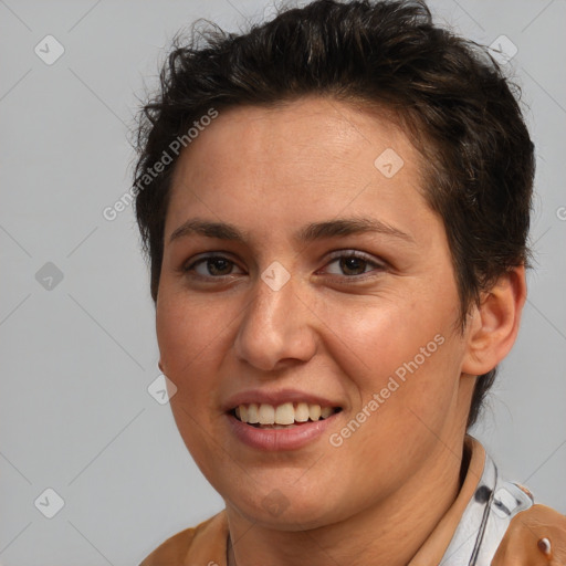 Joyful white adult female with short  brown hair and brown eyes