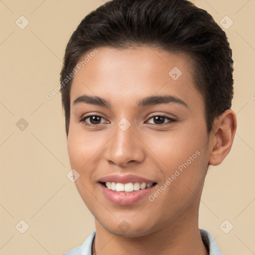 Joyful white young-adult female with short  brown hair and brown eyes