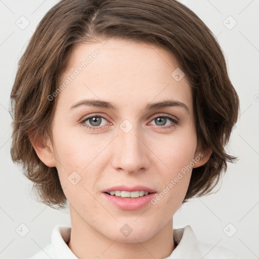 Joyful white young-adult female with medium  brown hair and green eyes