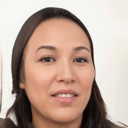 Joyful white young-adult female with long  brown hair and brown eyes