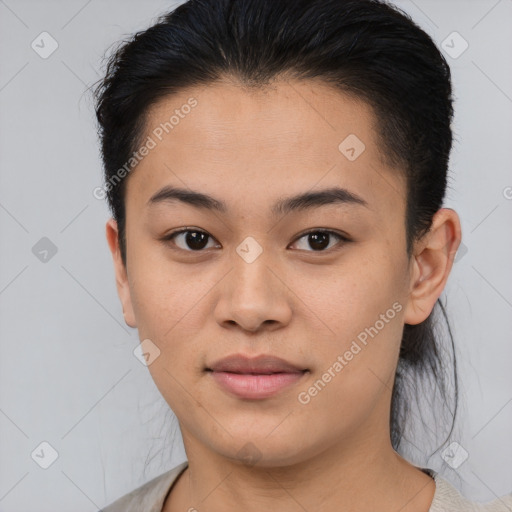 Joyful asian young-adult female with short  brown hair and brown eyes