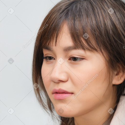 Neutral white young-adult female with medium  brown hair and brown eyes