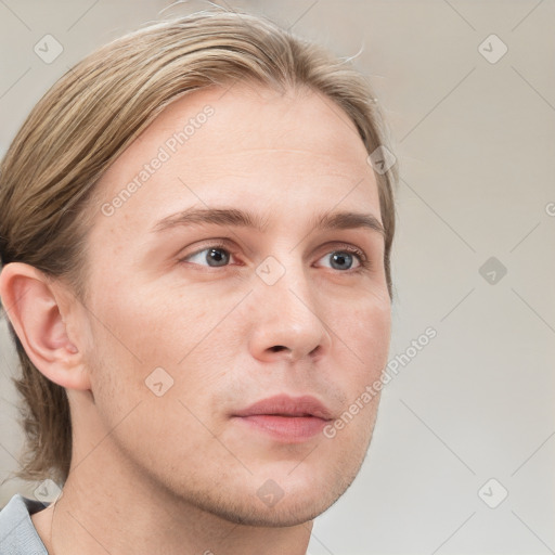 Neutral white young-adult male with short  brown hair and grey eyes