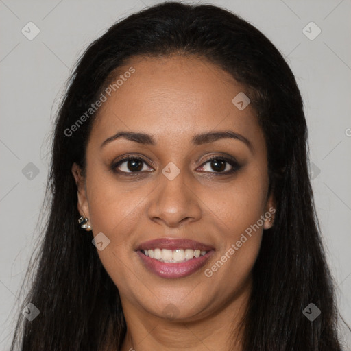 Joyful black young-adult female with long  brown hair and brown eyes