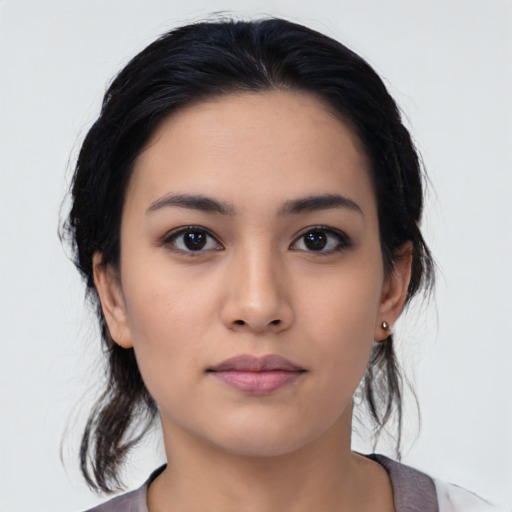 Neutral latino young-adult female with medium  black hair and brown eyes