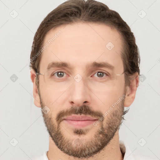 Joyful white adult male with short  brown hair and grey eyes