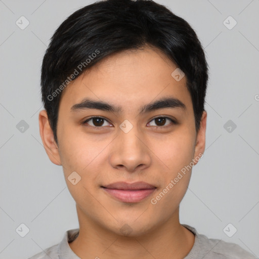 Joyful asian young-adult male with short  brown hair and brown eyes