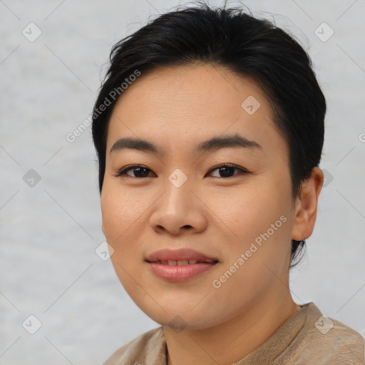 Joyful asian young-adult female with short  brown hair and brown eyes