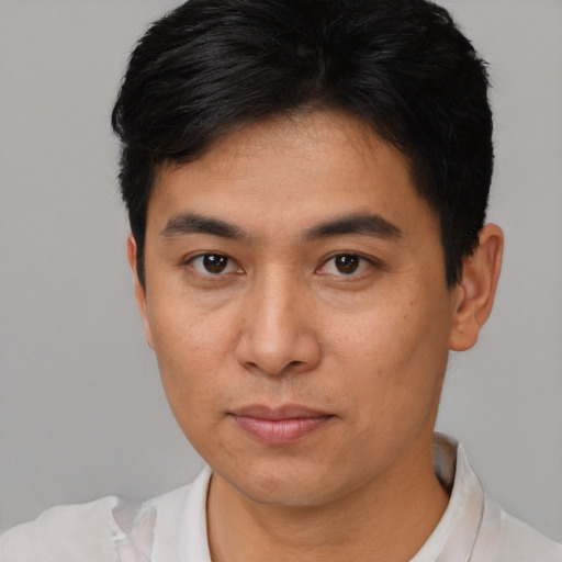 Neutral asian young-adult male with short  black hair and brown eyes