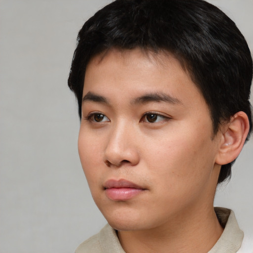 Neutral asian young-adult male with short  black hair and brown eyes