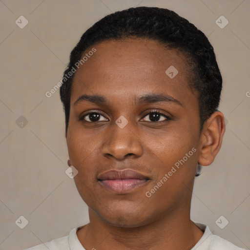 Joyful black young-adult female with short  black hair and brown eyes