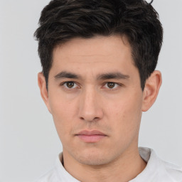 Neutral white young-adult male with short  black hair and brown eyes