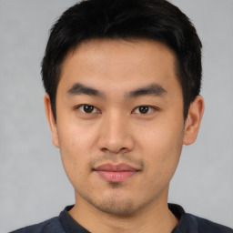 Neutral asian young-adult male with short  black hair and brown eyes