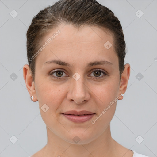 Joyful white young-adult female with short  brown hair and brown eyes