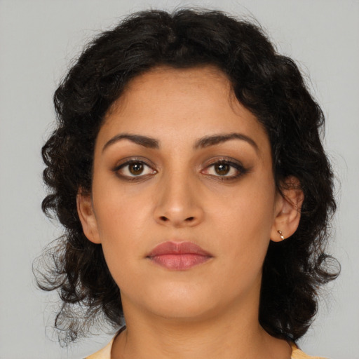Neutral latino young-adult female with medium  brown hair and brown eyes