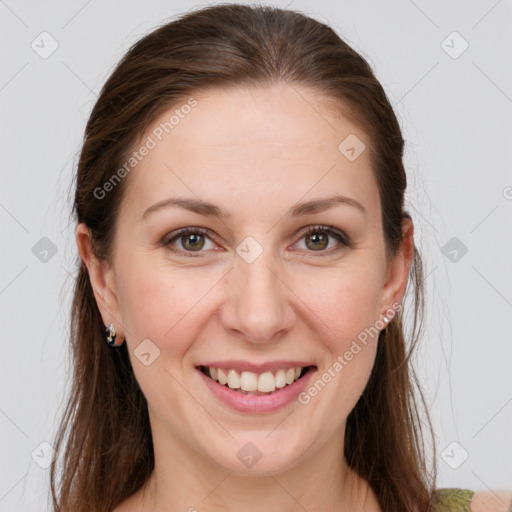 Joyful white young-adult female with long  brown hair and grey eyes