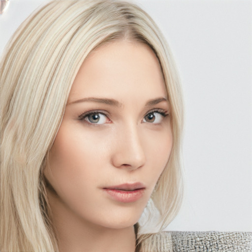 Neutral white young-adult female with long  blond hair and brown eyes