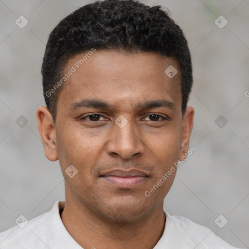 Joyful latino young-adult male with short  brown hair and brown eyes